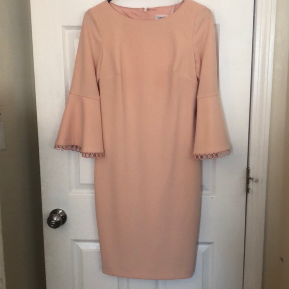 Elegant peach Calvin Klein bell sleeve dress